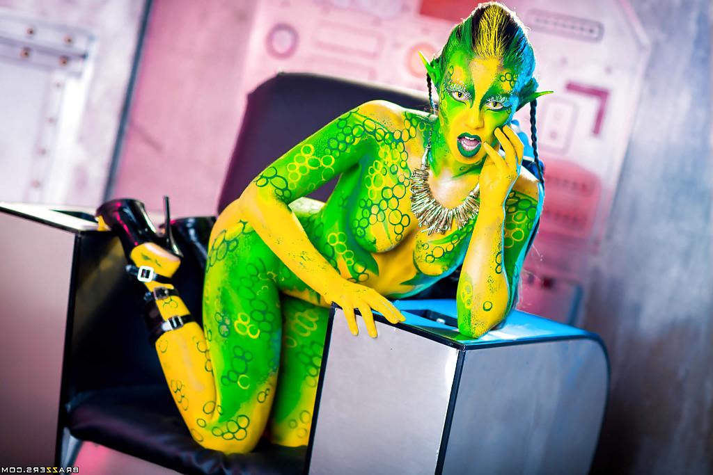 16P Kinky cosplay chick Tiffany Doll posing in body paint uniform and spreading