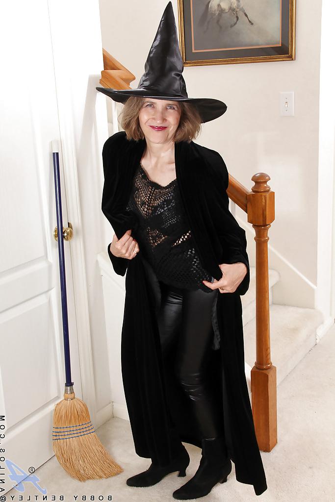 16P Smiley mature lady in cosplay outfit undressing and teasing her gash