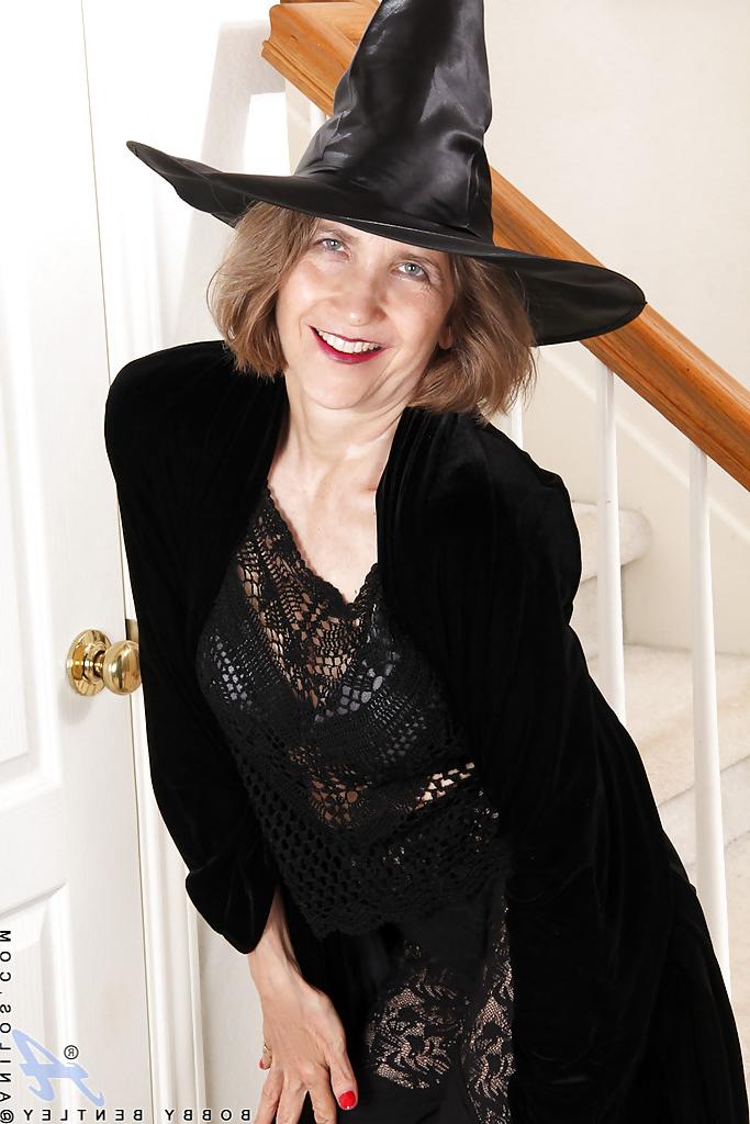16P Smiley mature lady in cosplay outfit undressing and teasing her gash
