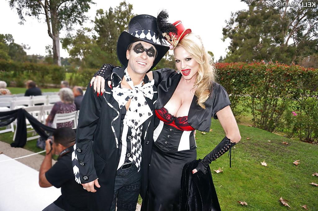 16P Older blonde MILF Kelly Madison modeling fully clothed in retro outfit
