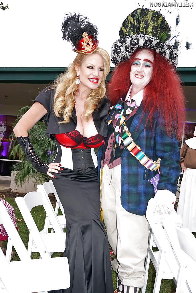 16P Older blonde MILF Kelly Madison modeling fully clothed in retro outfit