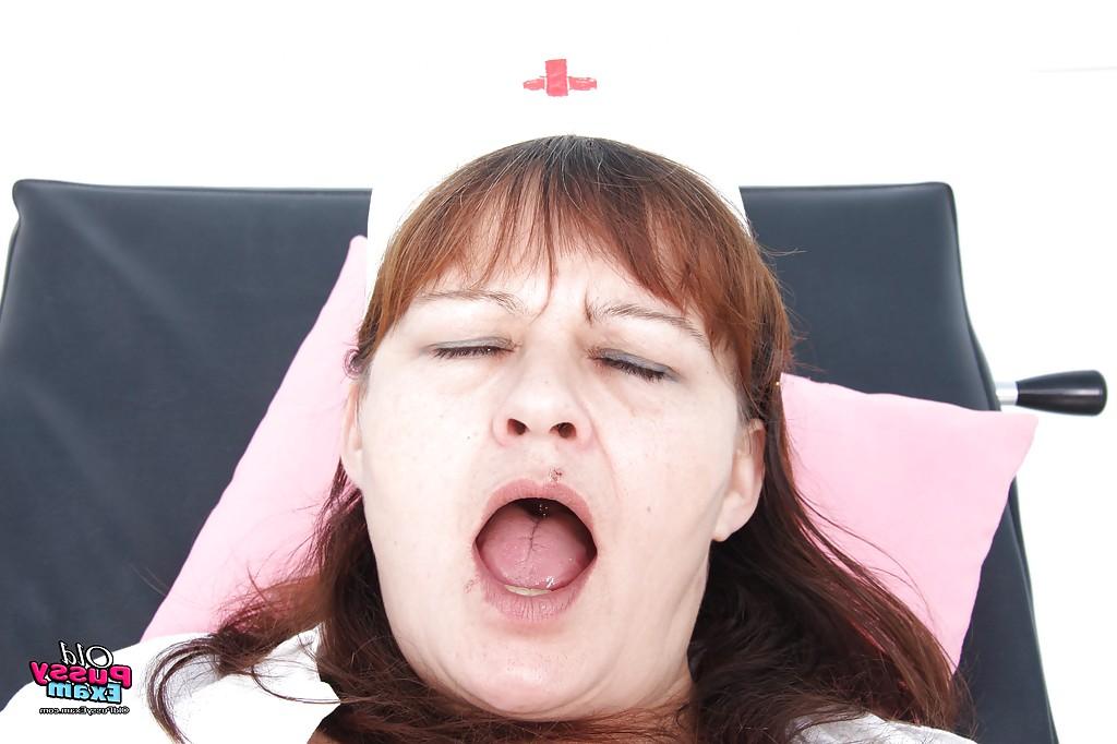 16P Naughty mature nurse stuffing her twat with a big dildo and gyno stuff