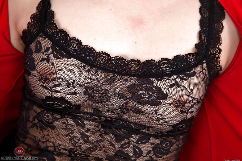 16P Experienced European woman Khalisa pulling bodystocking down to bare beaver