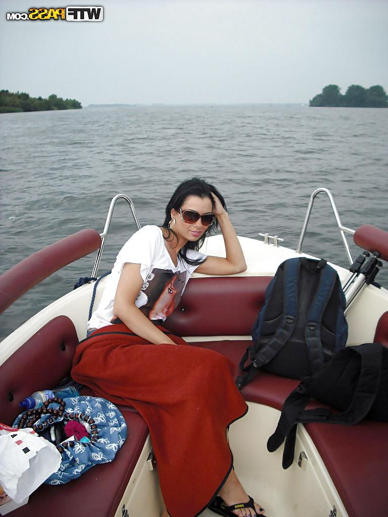 16P Full-bosomed brunette babe gets rid of her clothes at the boat tour