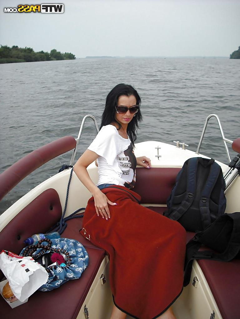 16P Full-bosomed brunette babe gets rid of her clothes at the boat tour
