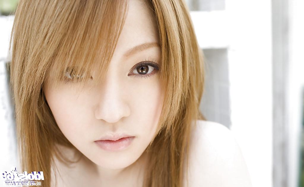 15P Stunning asian babe Ria Sakurai uncovering her graceful body outdoor