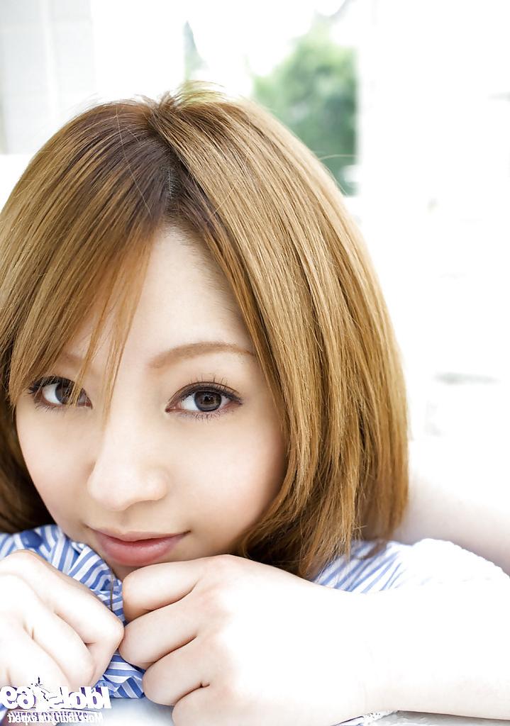 15P Stunning asian babe Ria Sakurai uncovering her graceful body outdoor
