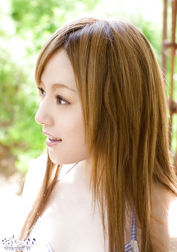 15P Stunning asian babe Ria Sakurai uncovering her graceful body outdoor