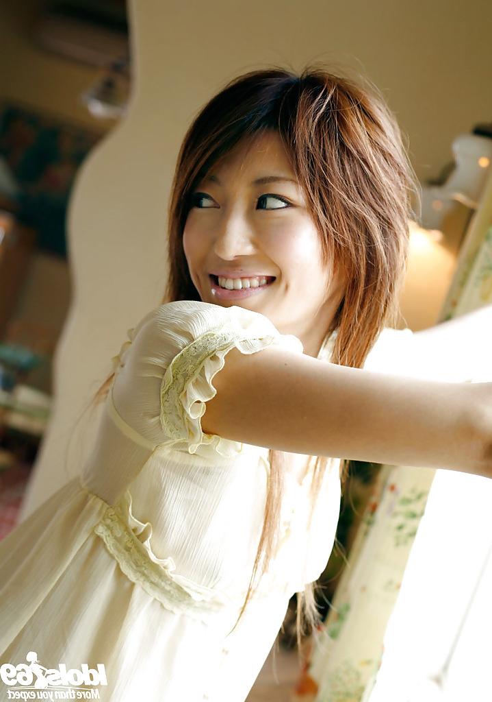 15P Foxy asian teen Yu Satome taking off her dress and posing in panties