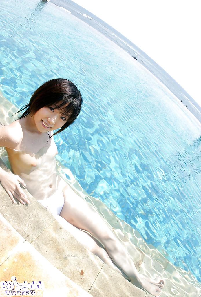 15P Cute asian babe Saki Ninomiya slipping off her dress and panties outdoor