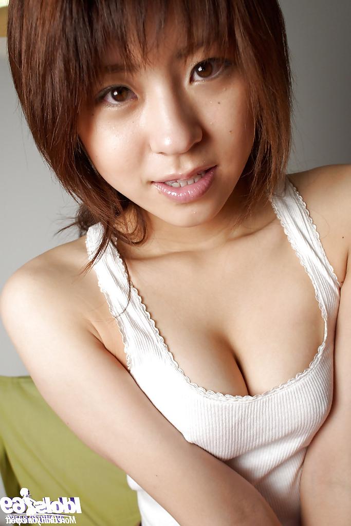 12P Pretty asian teen Haruka Tsukino slipping off her panties on the bed