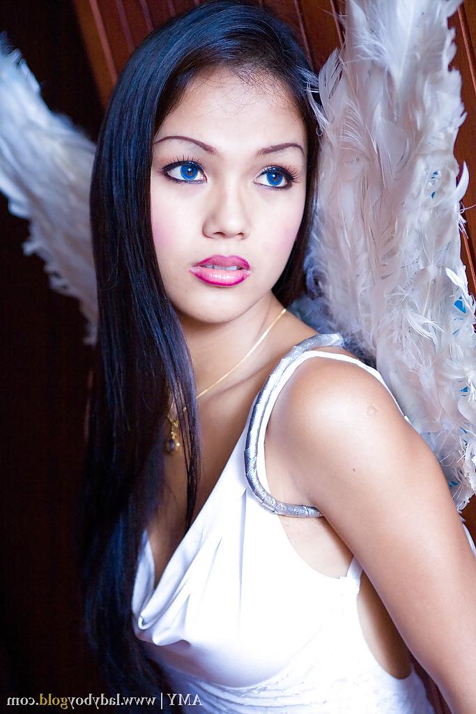 16P Stunning Thai ladyboy Amy taking off her angel costume and masturbating