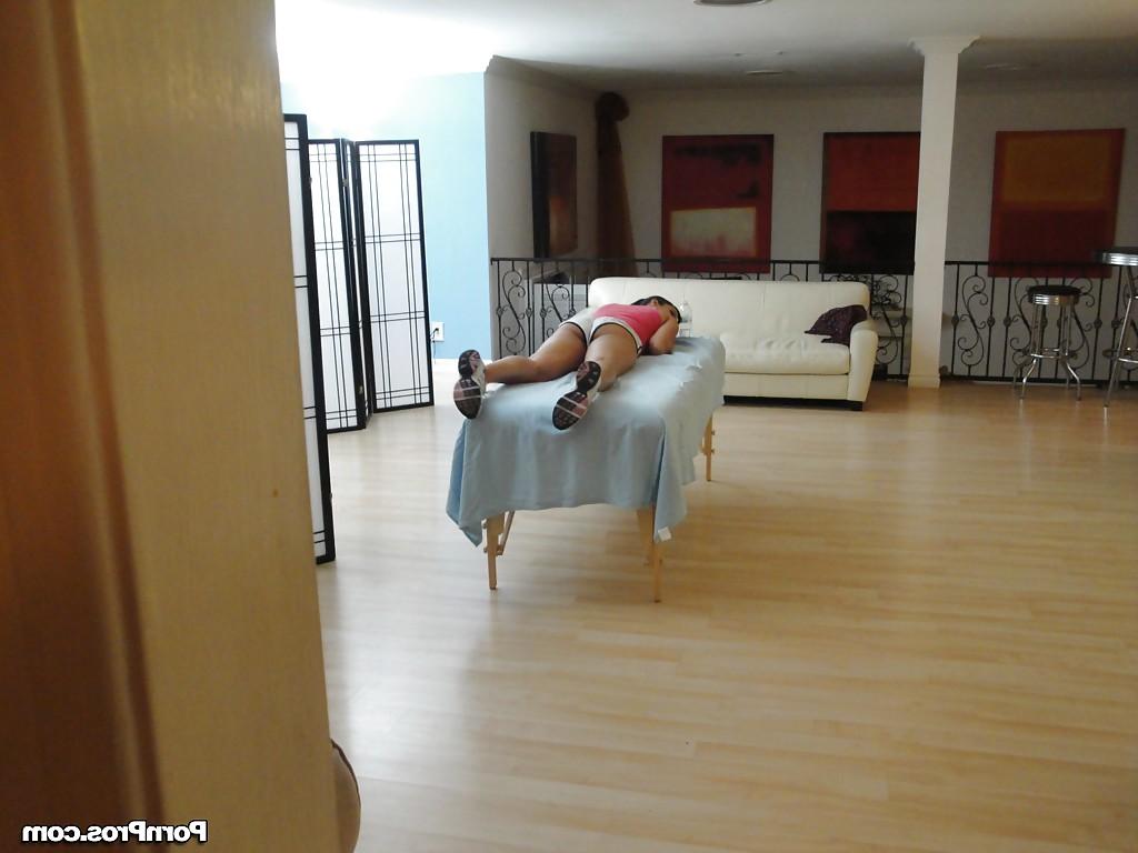 16P Busty MILF Isis Love getting naked on massage table before masseuse arrives