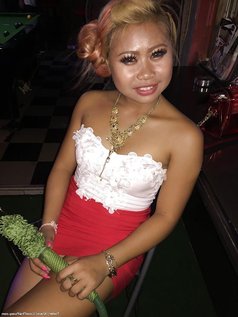 13P Kinky Oriental model Tiwter strips naked for bald cunt viewing