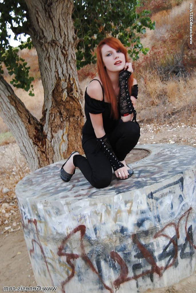 16P Redhead punk chick Nicci Vice showing off natural tits in forest