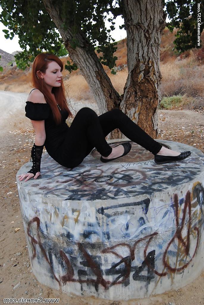 16P Redhead punk chick Nicci Vice showing off natural tits in forest
