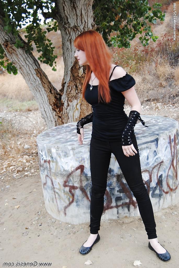 16P Redhead punk chick Nicci Vice showing off natural tits in forest
