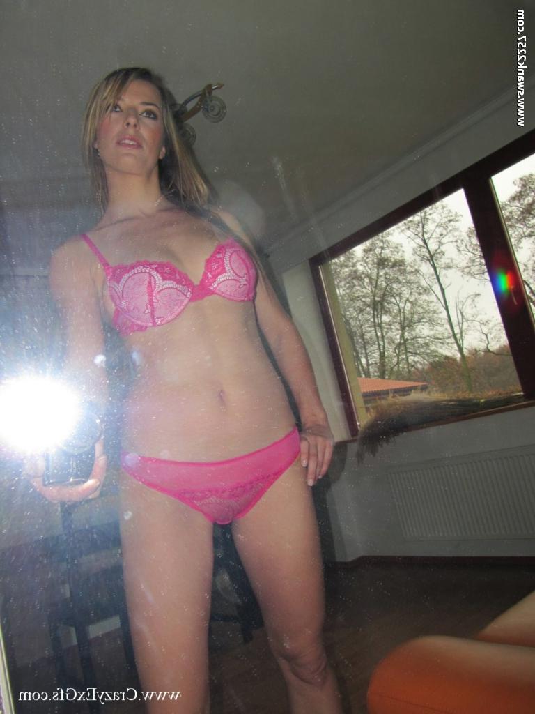 16P Blonde babe stripping off her lingerie and spreading her legs