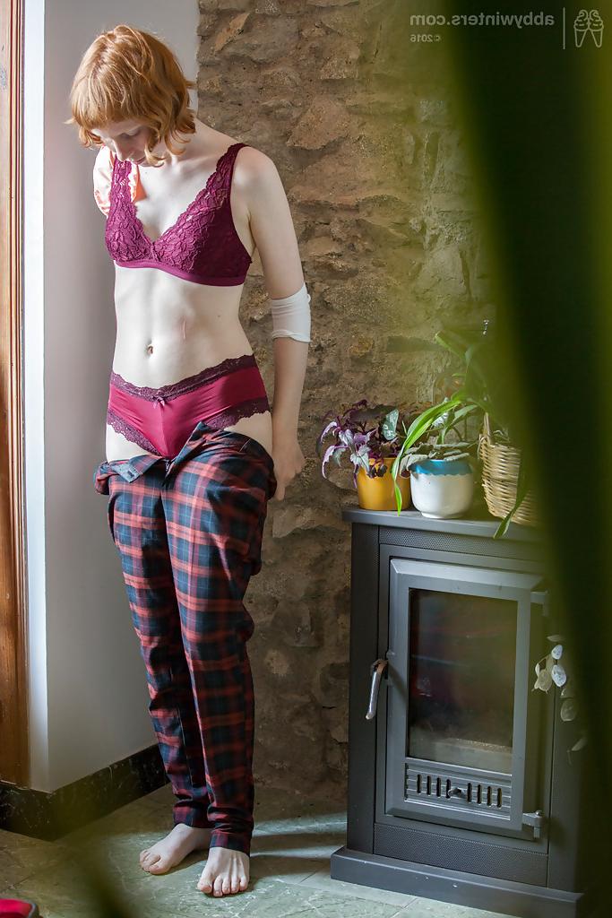 16P Skinny redheaded chick Emma B recorded getting dressed by hidden camera