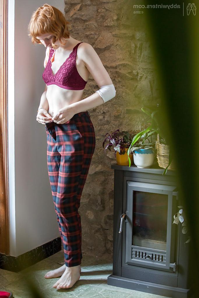 16P Skinny redheaded chick Emma B recorded getting dressed by hidden camera