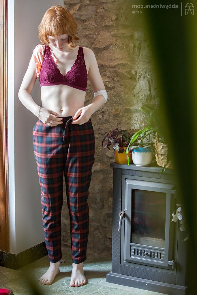 16P Skinny redheaded chick Emma B recorded getting dressed by hidden camera