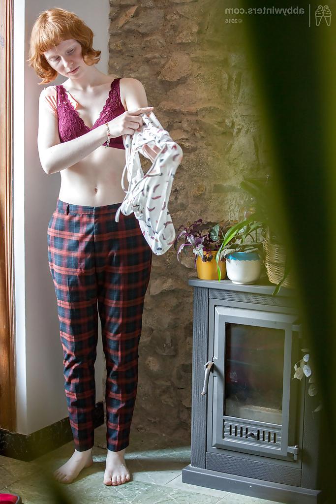 16P Skinny redheaded chick Emma B recorded getting dressed by hidden camera