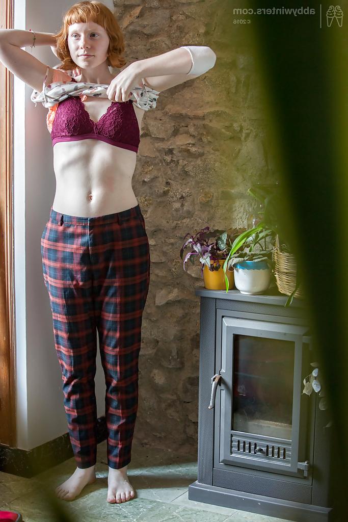 16P Skinny redheaded chick Emma B recorded getting dressed by hidden camera