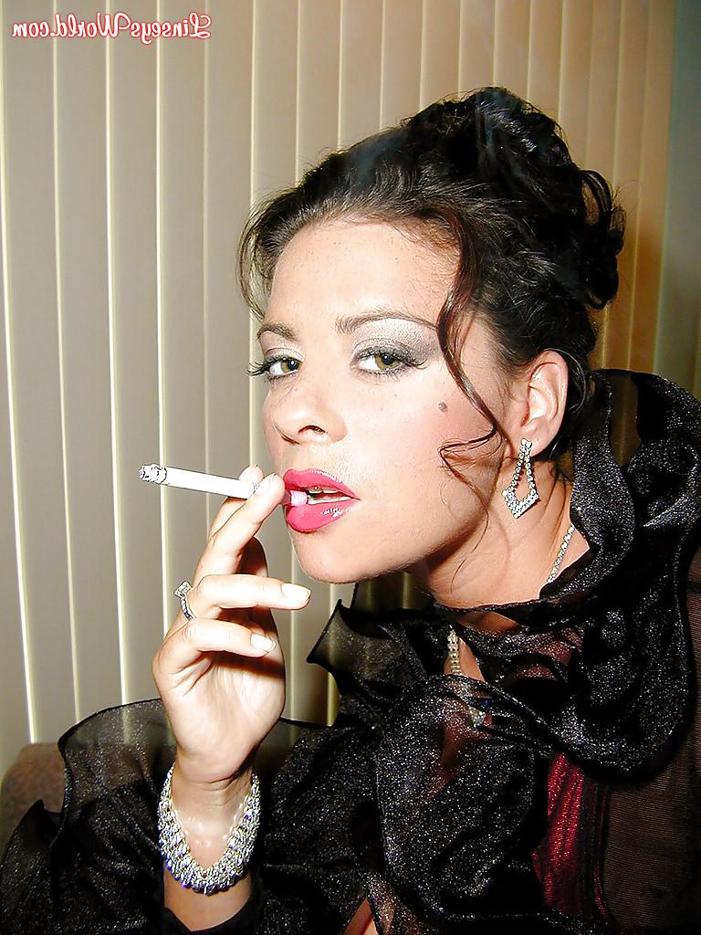 16P Busty stocking and lingerie clad MILF Linsey Dawn McKenzie having a smoke