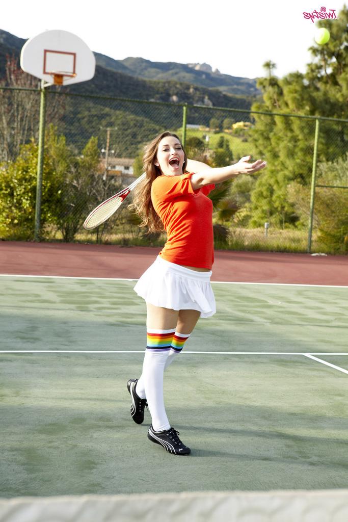 16P Sports babe Dani Daniels in sexy stockings spreading her legs outdoor