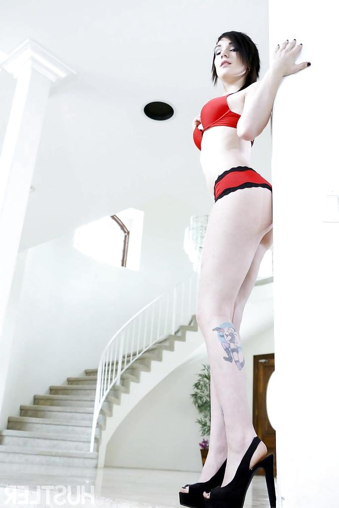 16P Tattooed brunette pornstar Nikki Hearst posing in high heels