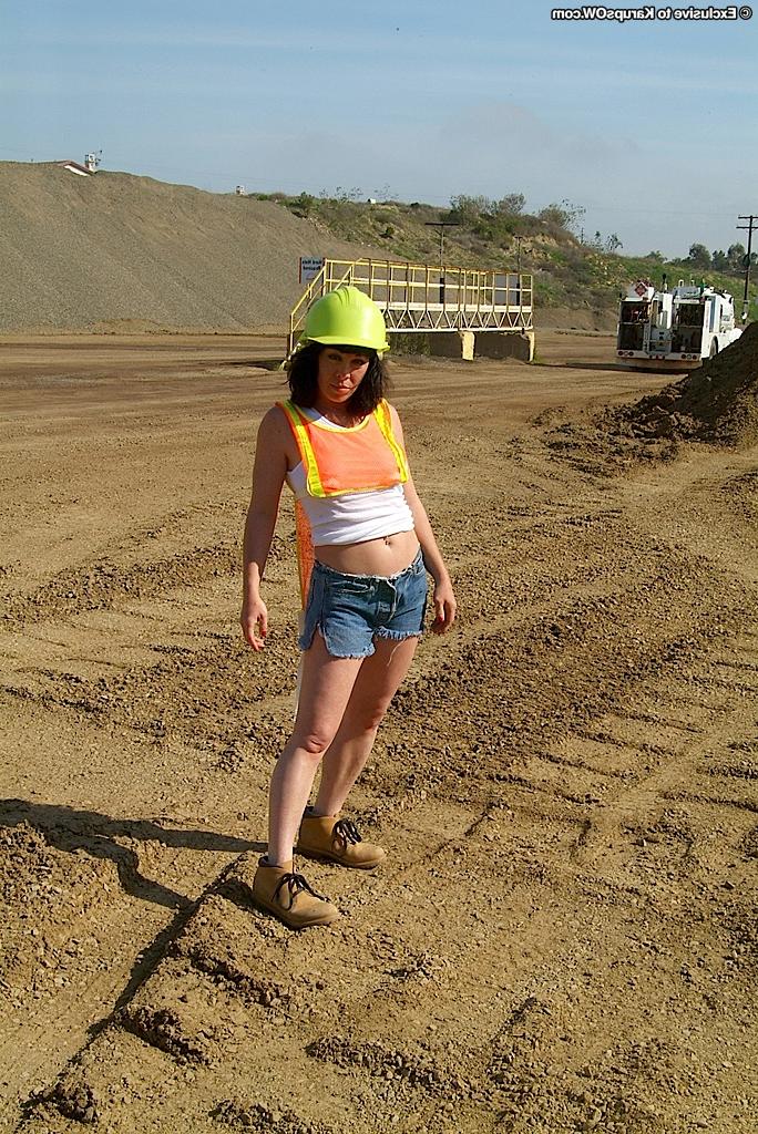 16P Naughty brunette chick in jeans shorts revealing her fuckable curves outdoor