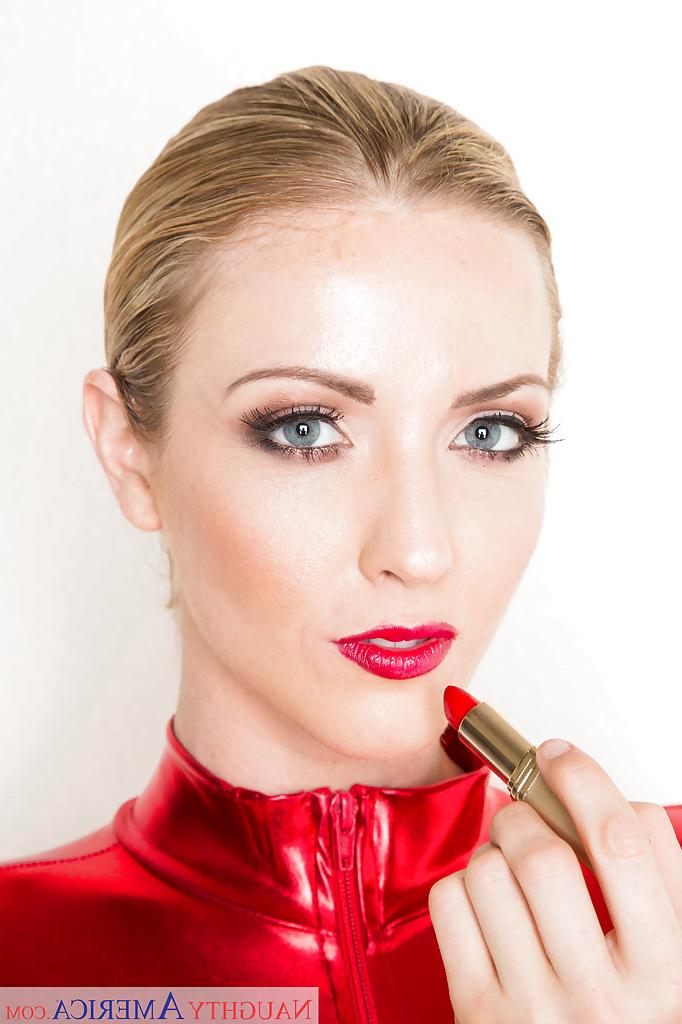 16P Blond first timer Karla Kush poses in red bodysuit while doing her lipstick