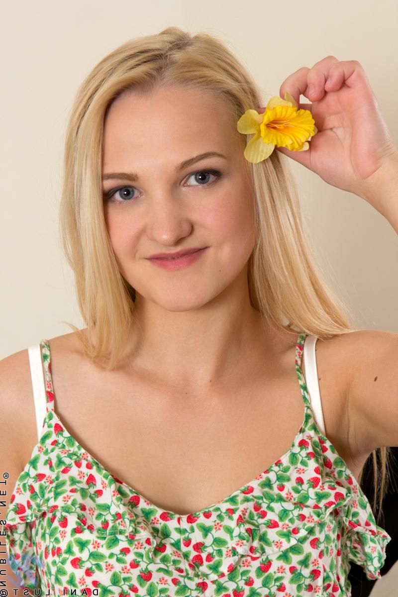 10P Cute blonde Dani Lust lifts short dress to flash lace panties in hot upskirt