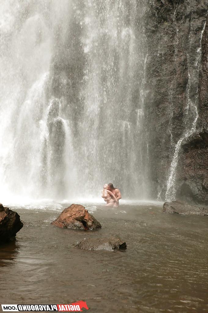 16P Stunning milf Jesse Jane fucks outdoor in the waterfall on cam
