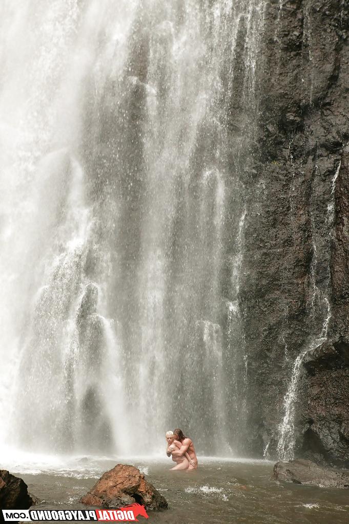 16P Stunning milf Jesse Jane fucks outdoor in the waterfall on cam