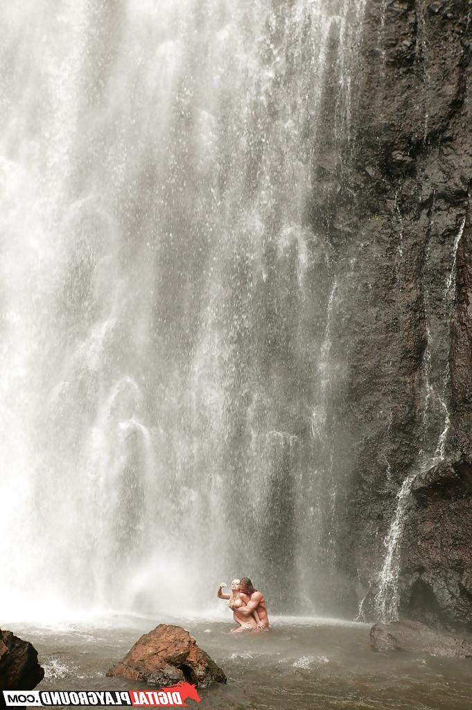 16P Stunning milf Jesse Jane fucks outdoor in the waterfall on cam