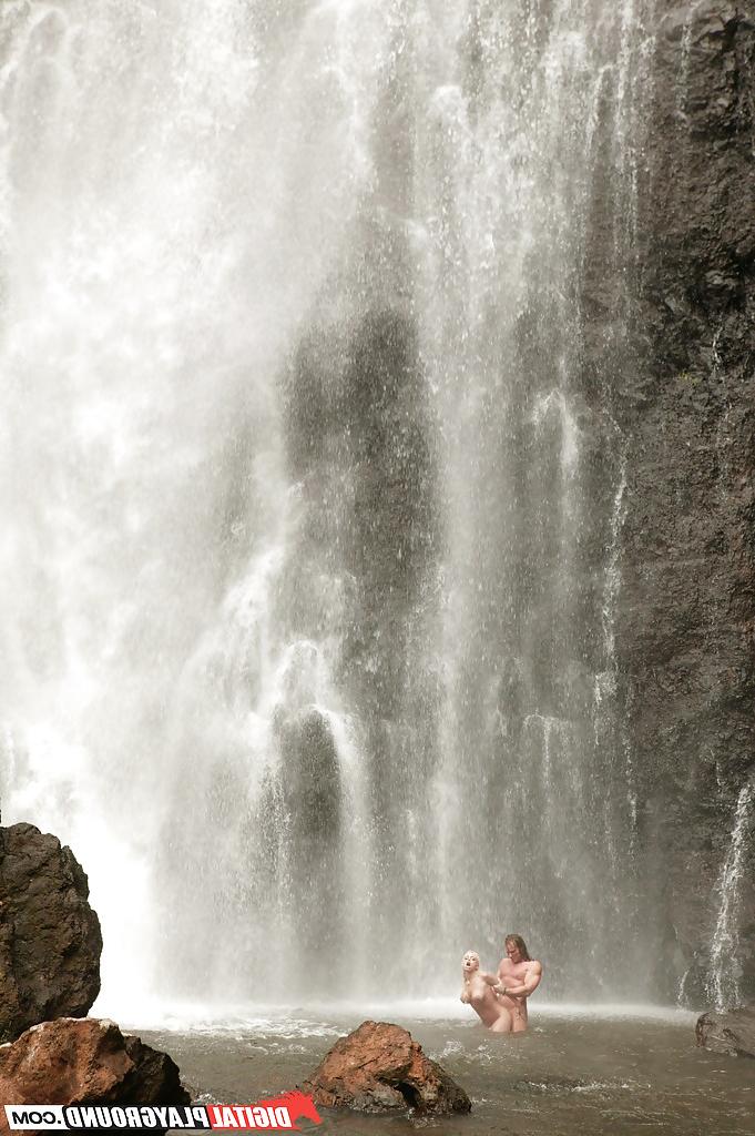 16P Stunning milf Jesse Jane fucks outdoor in the waterfall on cam