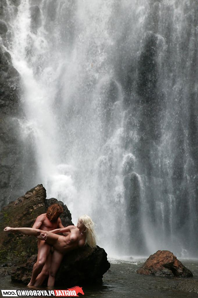 16P Stunning milf Jesse Jane fucks outdoor in the waterfall on cam