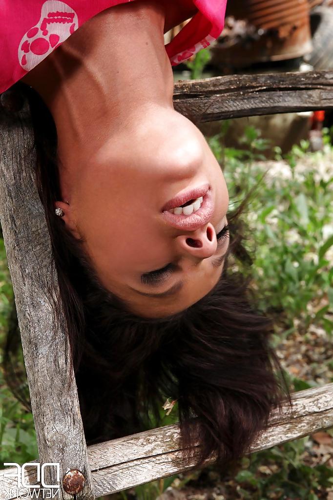 16P Brunette milf Nikita Bellucci is showing off outdoor in her pink dress