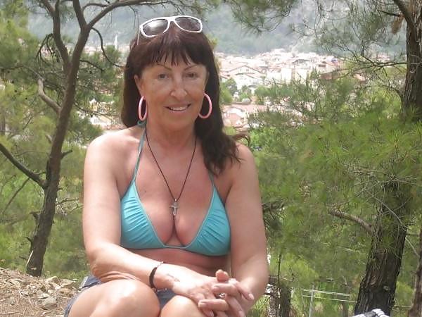 20P Older women in swimsuit.