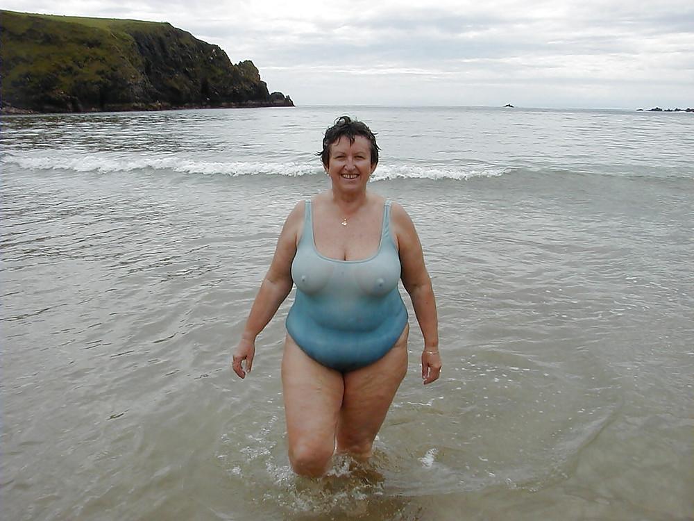 20P Older women in swimsuit.