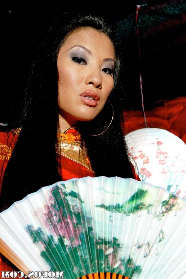 16P Asian big titted babe Asa Akira stripping and posing on high heels