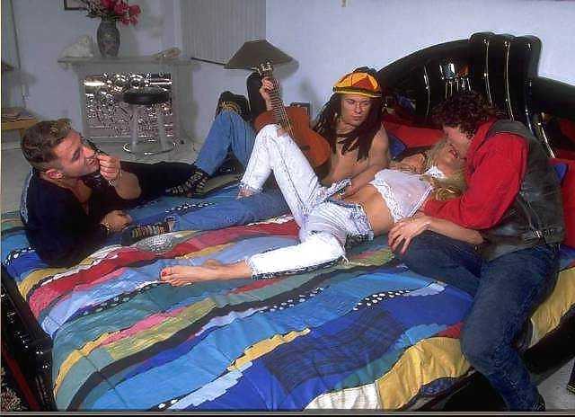 19P Blonde and three guys on a bed