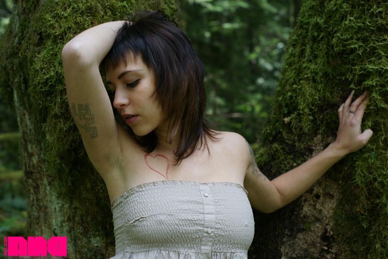 15P Alt teen Adora pulls down her dress in the woods