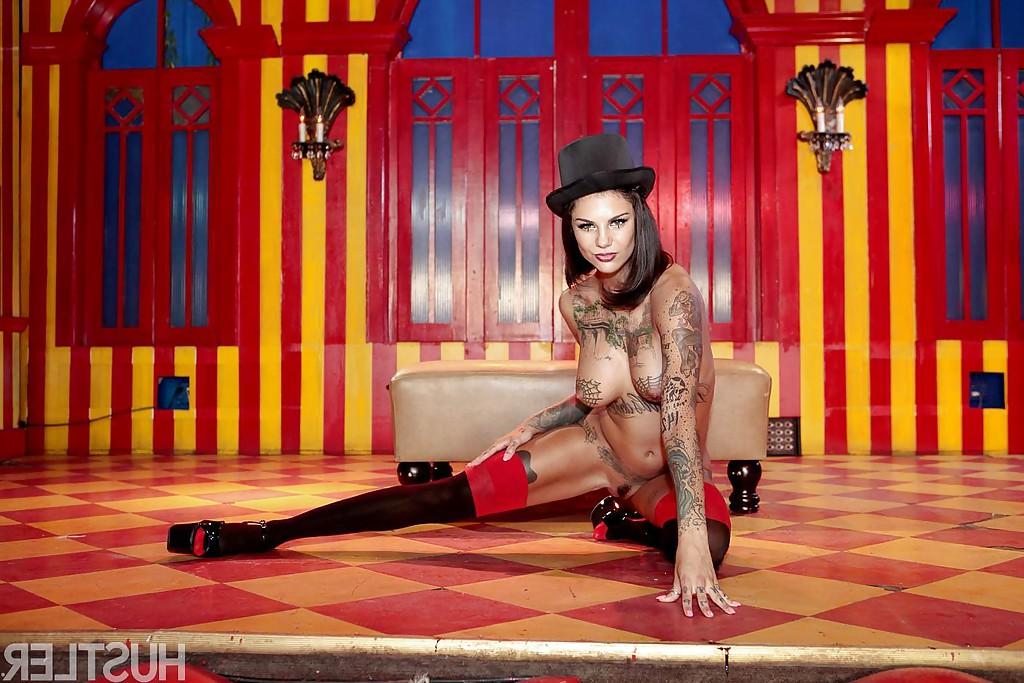 16P Tattooed solo girl Bonnie Rotten strutting in vintage stockings and heels