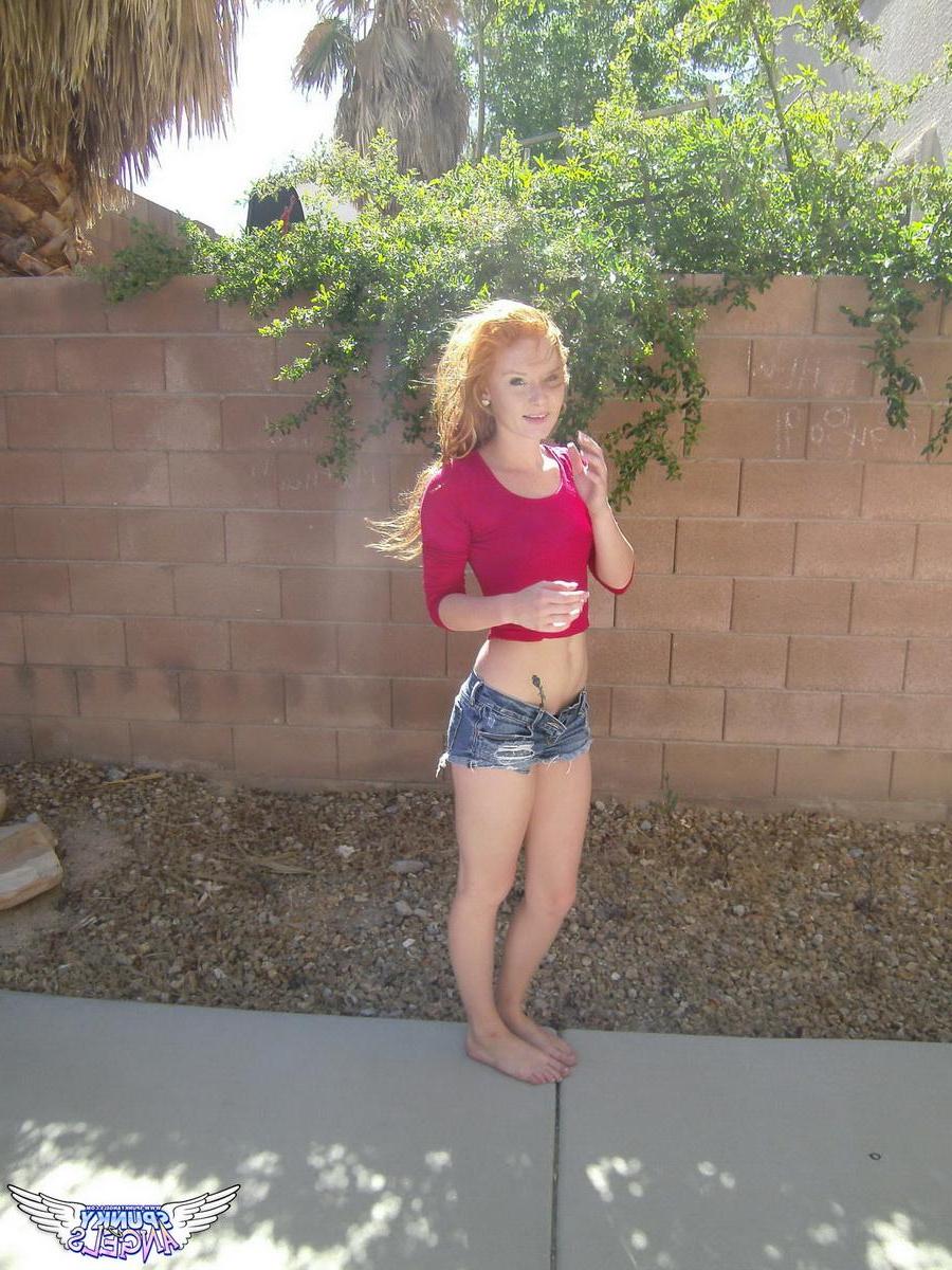 20P Redhead teen Alex Tanner flashes her hot tight body outside