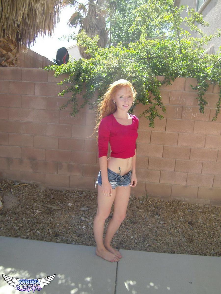 20P Redhead teen Alex Tanner flashes her hot tight body outside