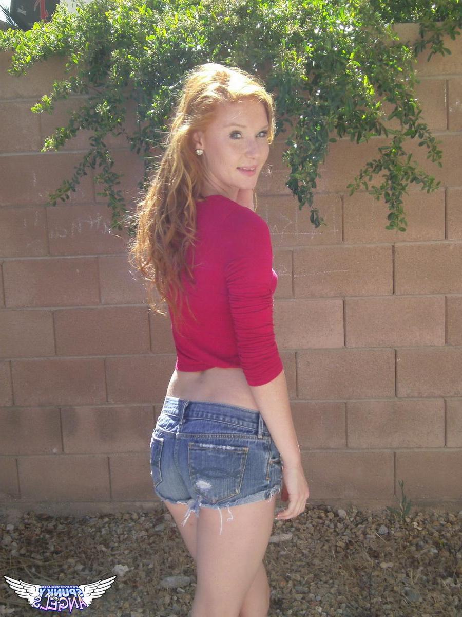 20P Redhead teen Alex Tanner flashes her hot tight body outside