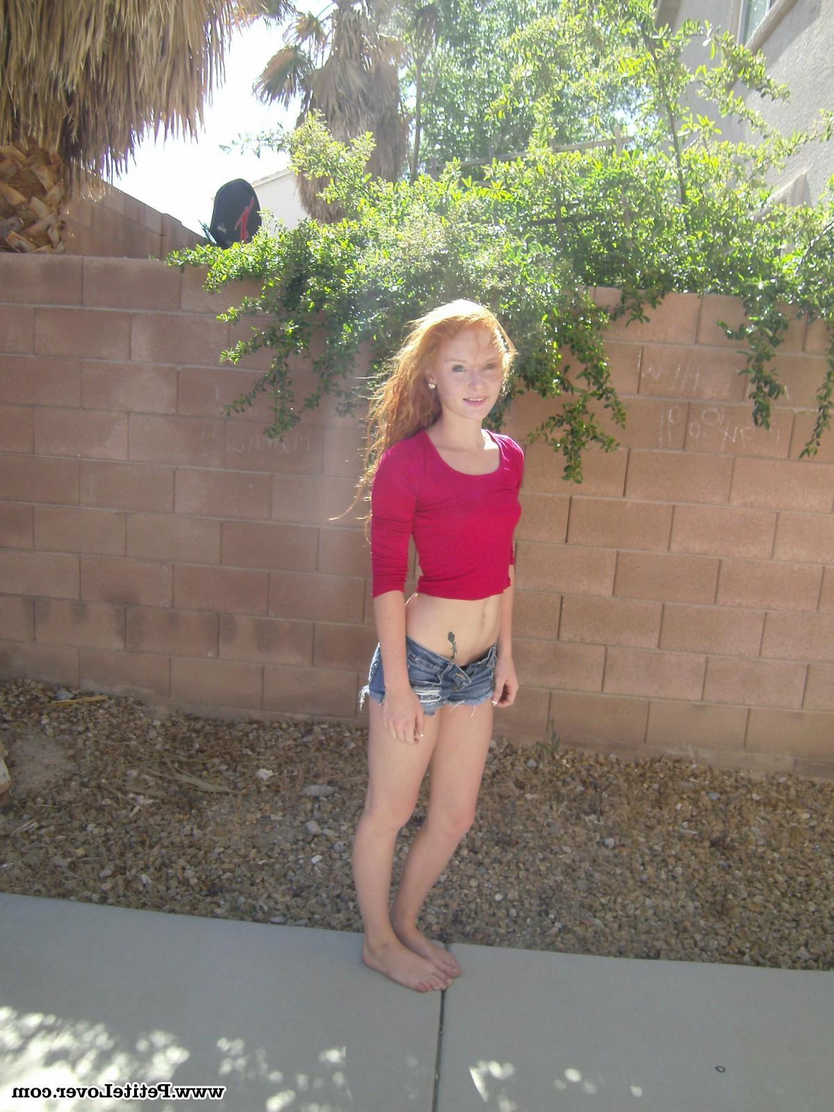 16P Redhead teen Alex Tanner flashes her tight body for you in the backyard