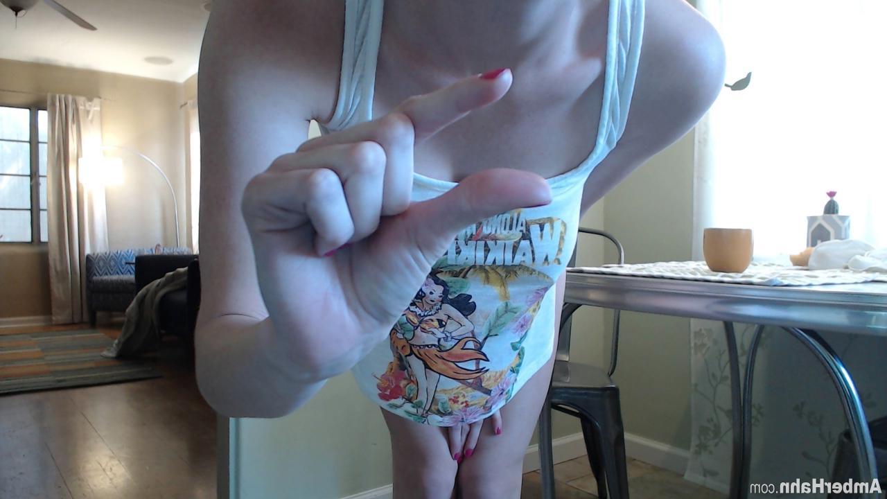 15P Amber Hahn strips and shows off her hot body on the phone